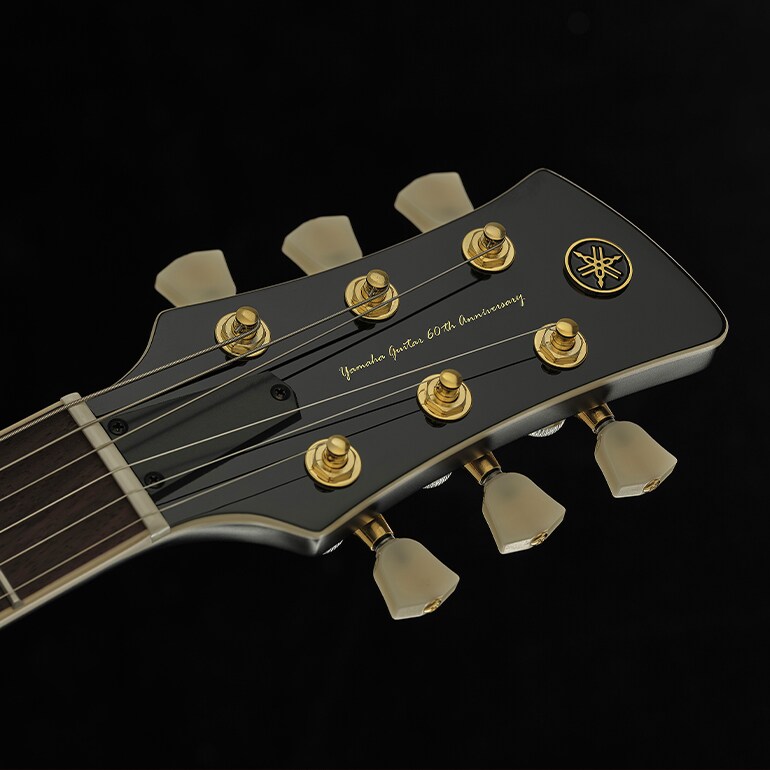The headstock displays a distinctive 60th Anniversary logo, symbolizing six decades of craftsmanship.