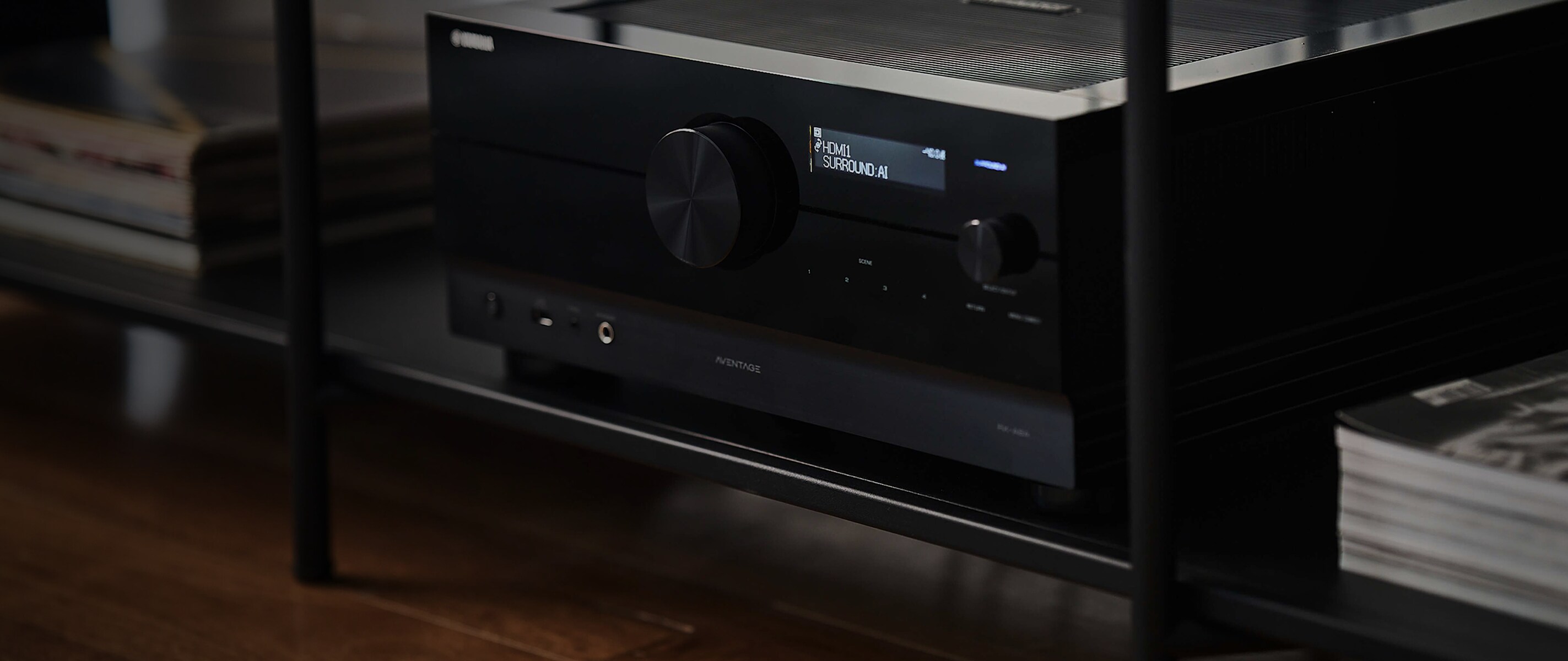 A woman playing an Yamaha Grand Piano dramatically on a stage.