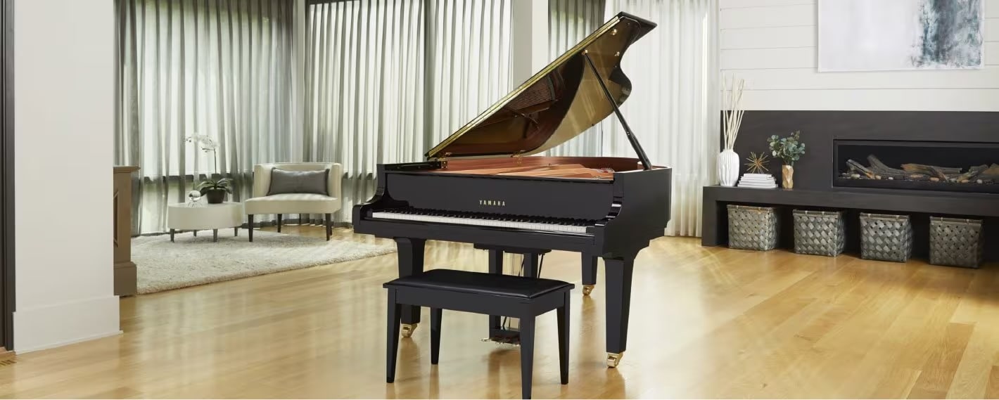An SX Series grand piano in a clear, open, and airy room.