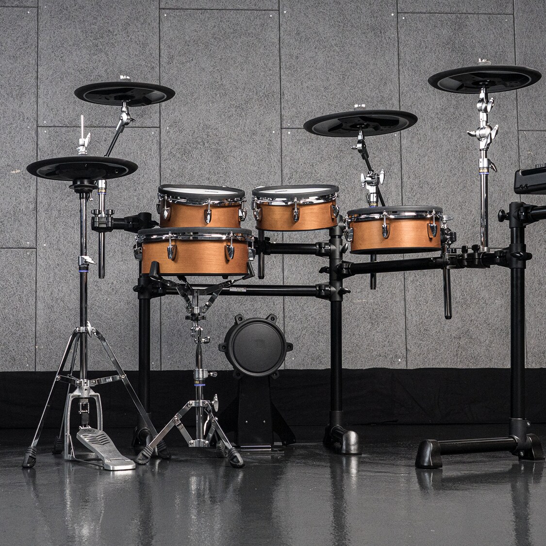 A DTX-10 electronic drum kit in rear profile