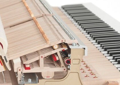 Acoustic piano hammer mechanisms.