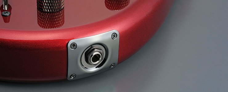 Metal plate provides strength for the output socket of the TRBX304 electric bass